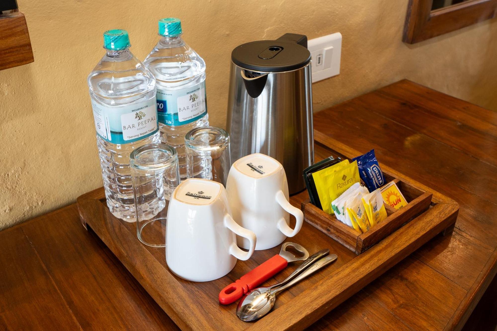 Bar Peepal Resort Pokhara Luaran gambar A tea tray